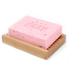 Load image into Gallery viewer, Rosewood &amp; Ylang Made with Rosewood and Ylang Essential Oils, with dried rose petals, this soap smells luxuriously sweet and floral. Perfect for pampering.  Hand crafted using only sustainable palm oil, age-old botanicals and pure aromatic oils, these almost mythical soaps will transform your daily wash into a cleansing ritual to be savoured. SLS and Parabens free.